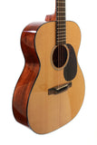 Acoustic guitar with a wooden finish on a white background
