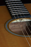 Close-up of a guitar's serial number