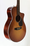 Acoustic guitar with a sunburst finish on a white background