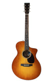 Acoustic guitar with a sunburst finish on a white background